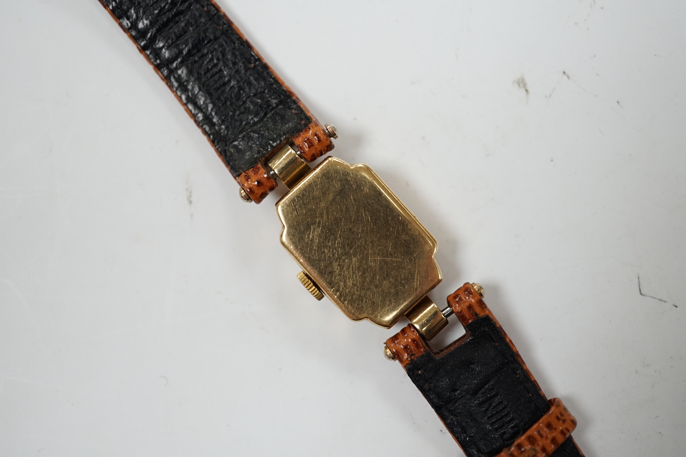 A lady's 1950's 9ct gold Rolex manual wind wrist watch, on later associated leather strap.